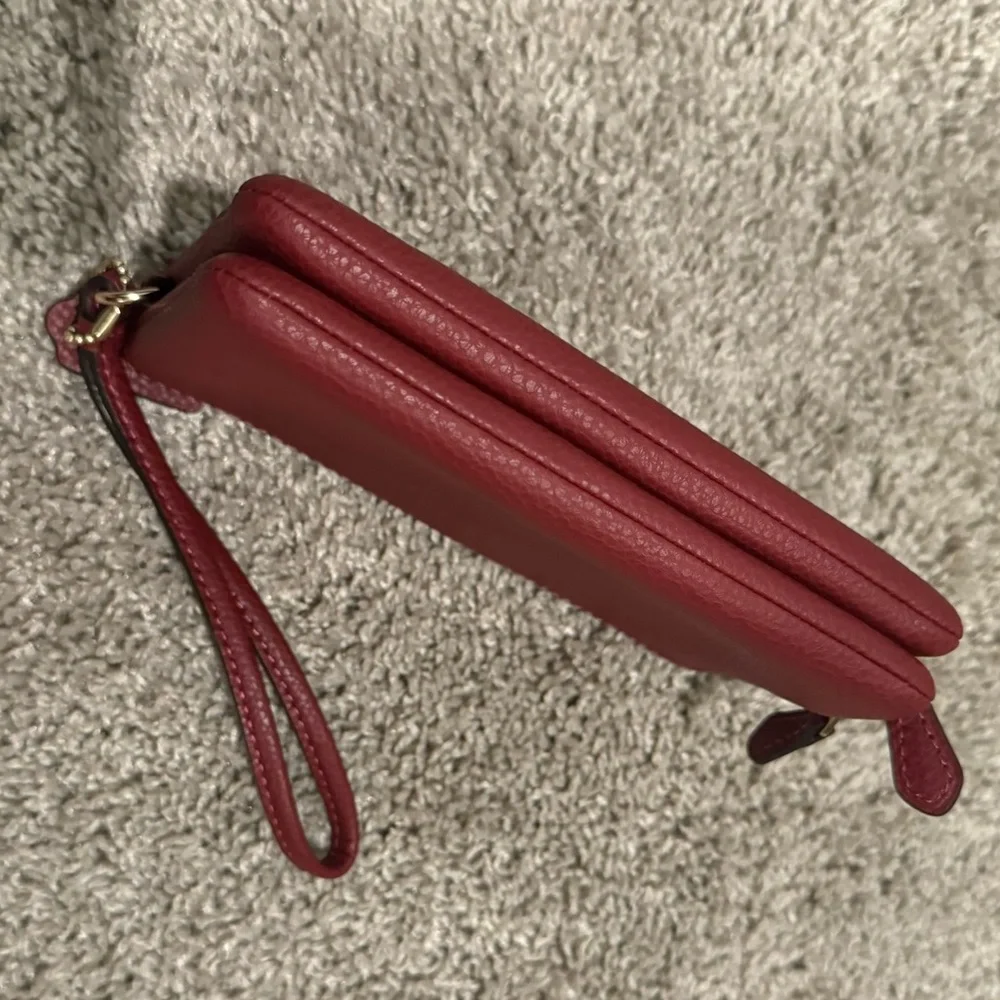 Like 🆕 Coach saturated magenta mini wristlet wallet pouch